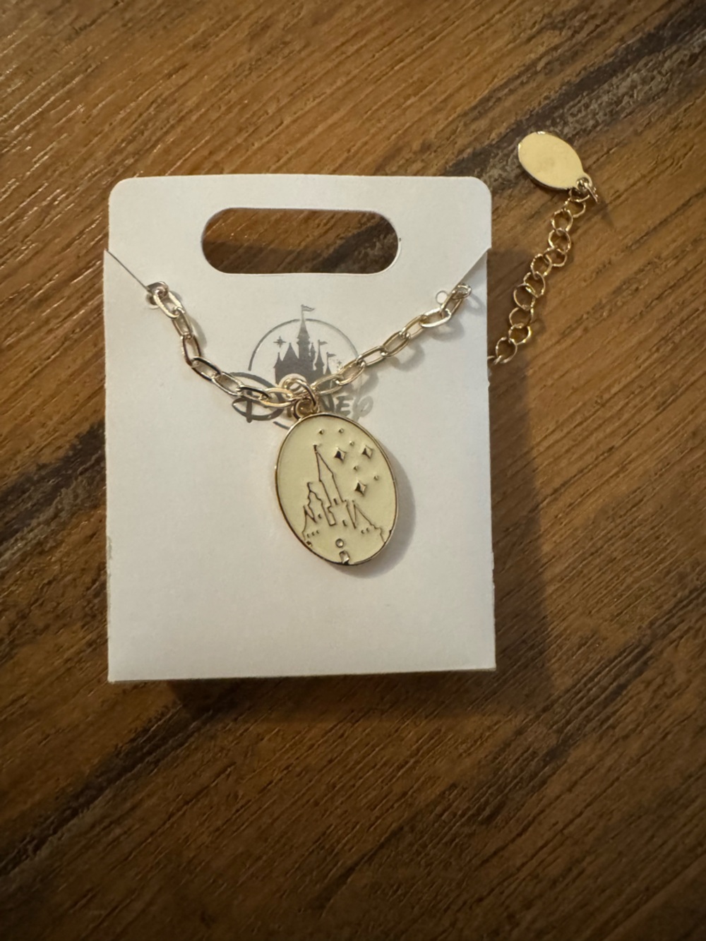 Disney Gold-Tone Castle Charm Necklace in Cream
